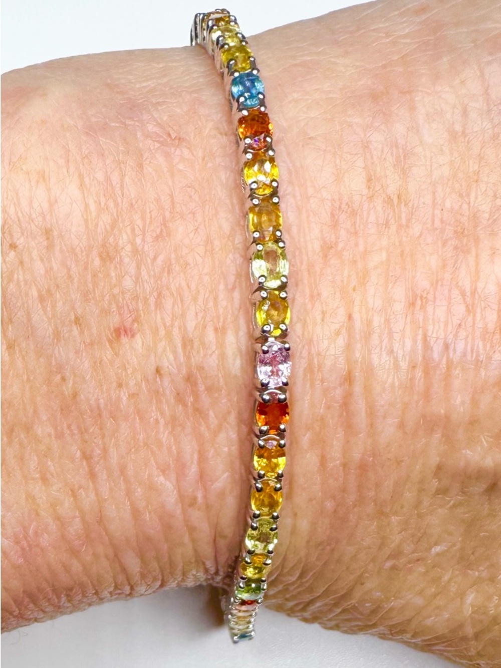 Genuine Multicolor Sapphire Tennis Bracelet
18K WG/Sterling - Picture 4 of 5